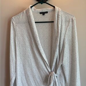 White  and Black Polka Dot Wrap Top by Adrianna 
Size medium
